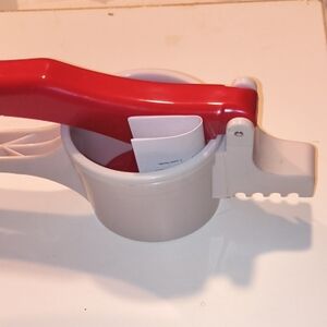 Red and Gray Handheld Juicer